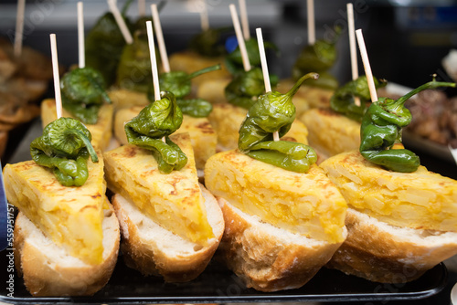 Photography Iberian omelette in tapas bar in Spain, traditional Spanish food