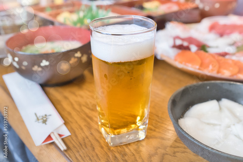 Beer with Japanese New Year's traditional dishes.