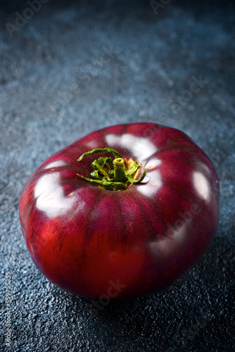 Black kumato tomato photo