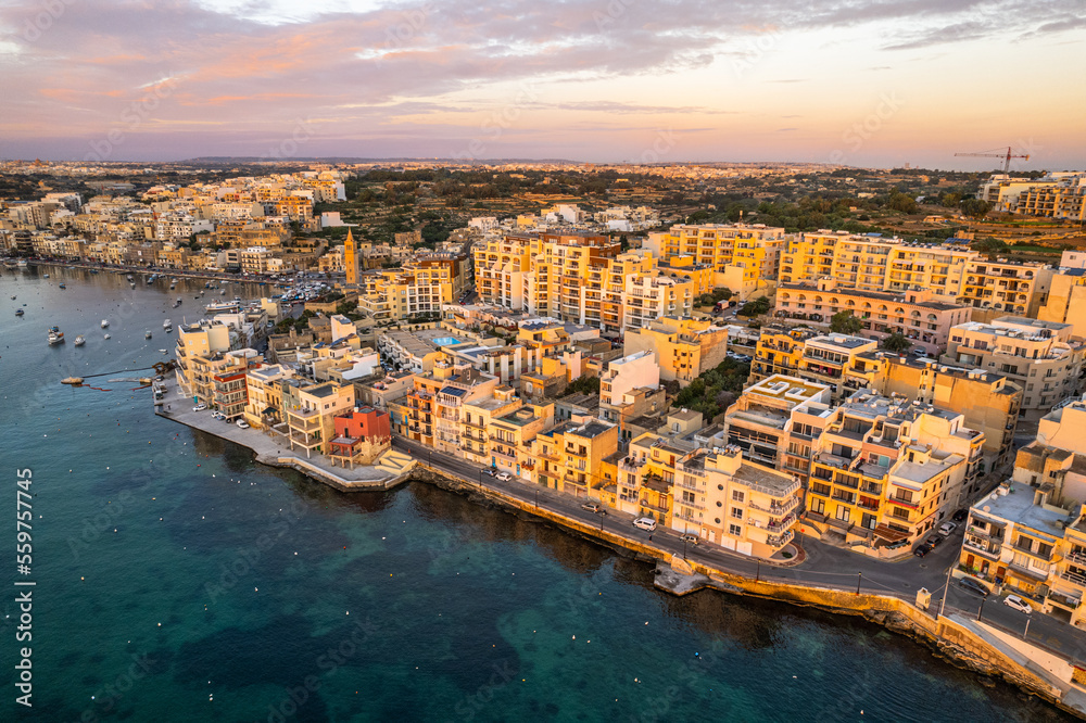 Fototapeta premium Marsaskala townscape at sunrise, Malta. Aerial drone view