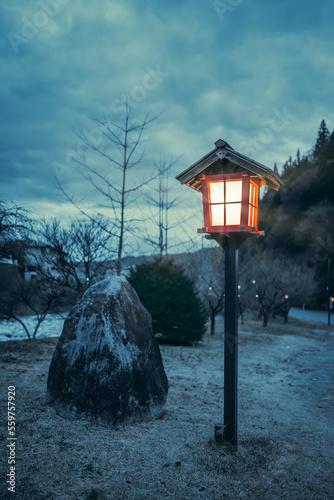 The warm glow of red lanterns in the cold night air.
