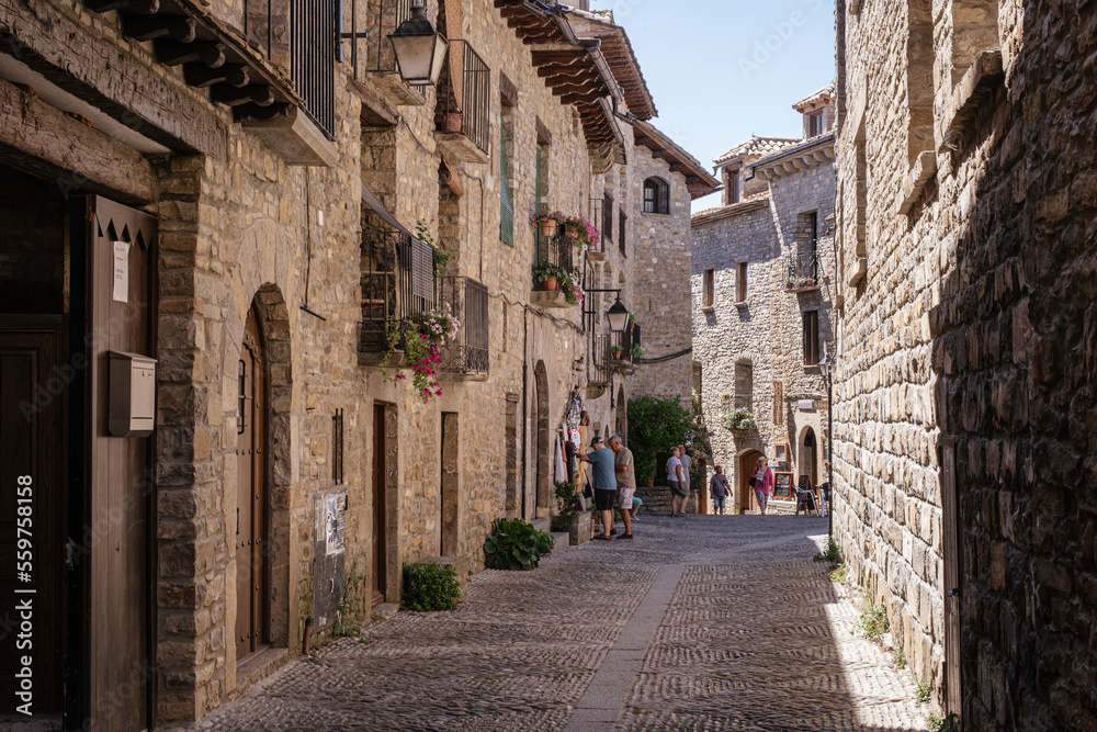  Main street of a typical beautiful villages of Spain - Ainsa Sobrarbe ,Huesca province, Pirenei mountains. High quality photo