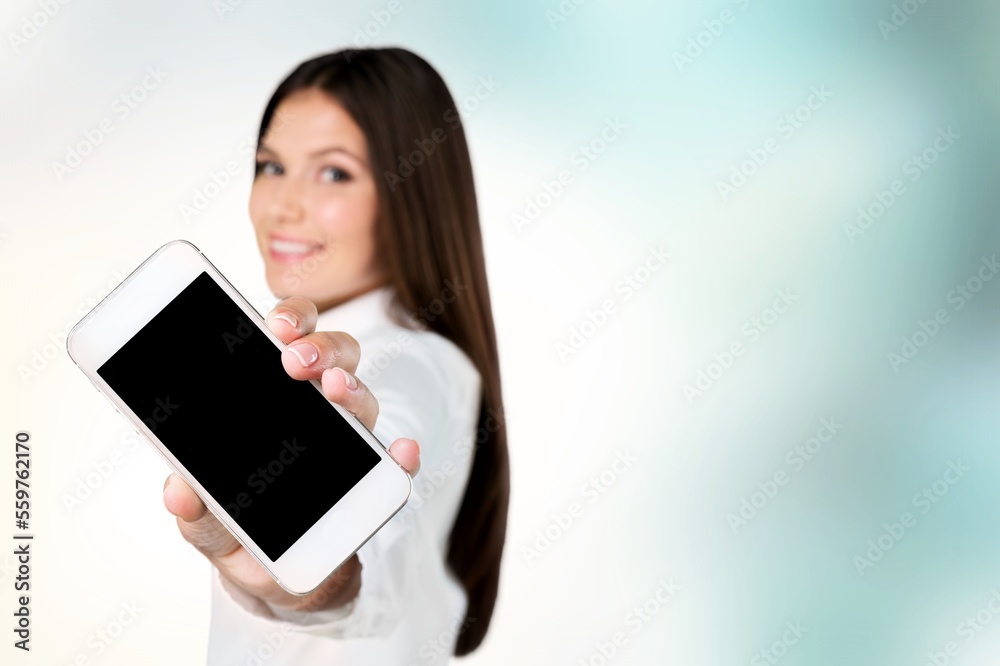 Happy person showing phone with blank screen Happy person showing phone with blank screen