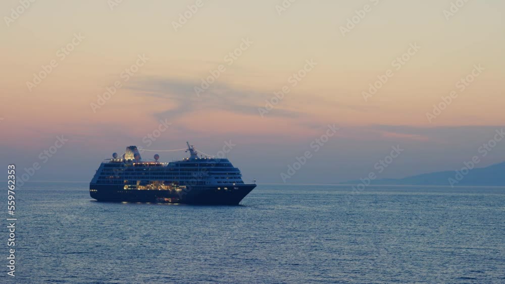 Cruise ship in the Aegean Sea, Greece, at sunset Cruise ship in the Aegean Sea, Greece, at sunset