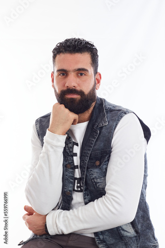 elegant man with beard  in casual wear with face reaction photo