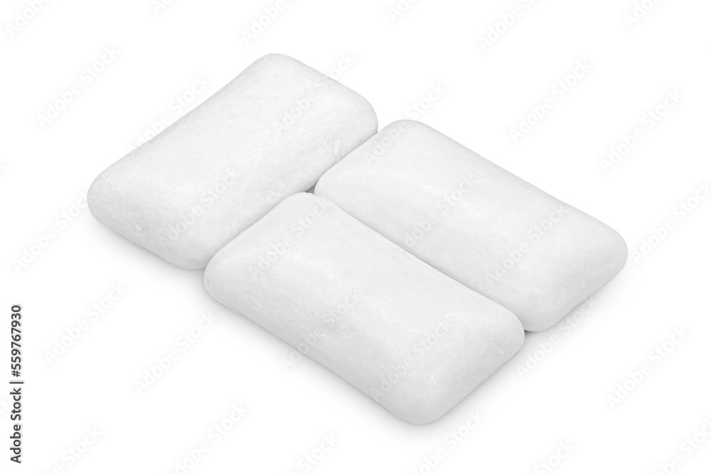 Three pieces of white chewing gum isolated on white. The whole subject is in focus. Three pieces of white chewing gum isolated on white. The whole subject is in focus.