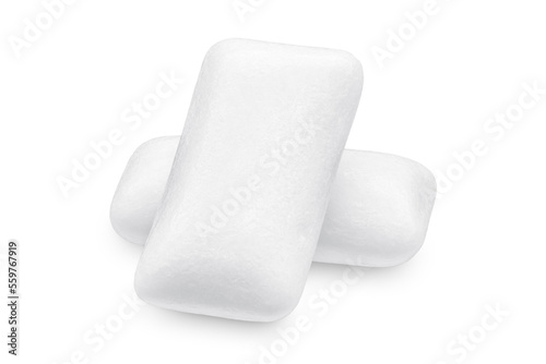 Fotografie Three pieces of white chewing gum isolated on white