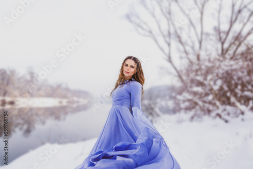 A woman in a dress by the Vistula River 