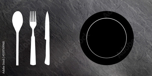 Topview of Set of Plate, Fork and Knife Silhouette on Dark Gray Background photo