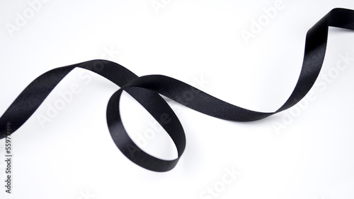Obraz na plátně Abstract shape black ribbon isolated on white background.