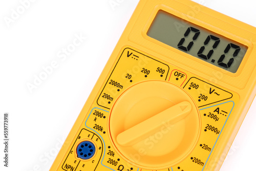 Digital multimeter with probes on a white background.  photo