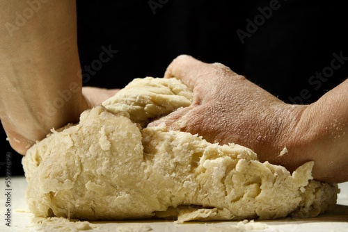 hands with dough