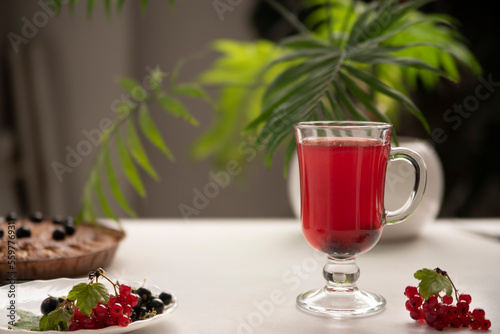 juice, a drink of black and red currants in a glass