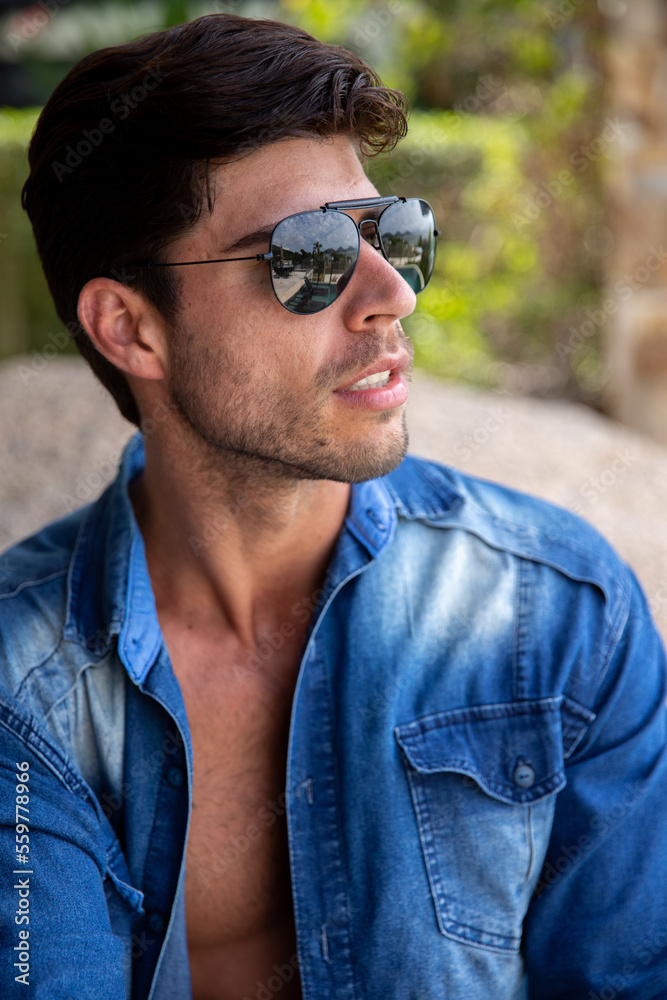 portrait of a man, portrait of a handsome man wearing sunglasses