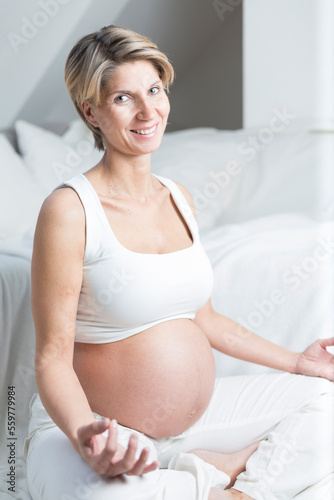 Pregnant woman practices yoga Free Download Pregnant woman practices yoga - GFXLoad