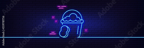 Neon light glow effect. Cleaning bucket with sponge line icon. Washing Housekeeping equipment sign. 3d line neon glow icon. Brick wall banner. Sponge outline. Vector