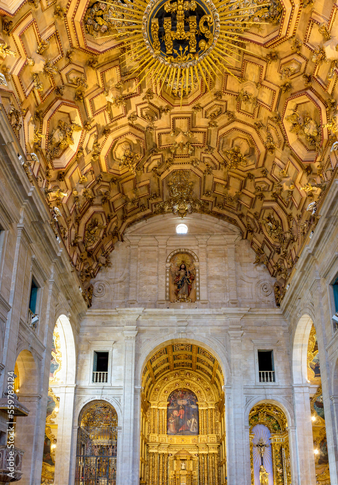 Interior of a historic baroque church in Salvador, Bahia, richly decorated with gold-plated walls and altar