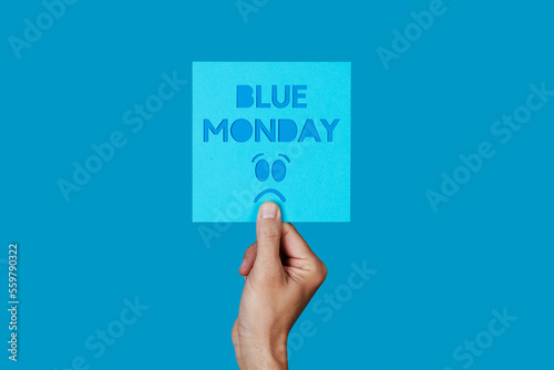 Fototapeta sign with the text blue monday and a sad face