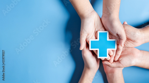 Health insurance concept. people hands holding plus and healthcare medical icon, health and access to welfare health concept. © Kiattisak