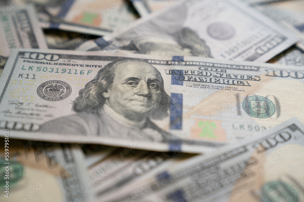 US one hundred dollars bills money, finance and business concept US one hundred dollars bills money, finance and business concept