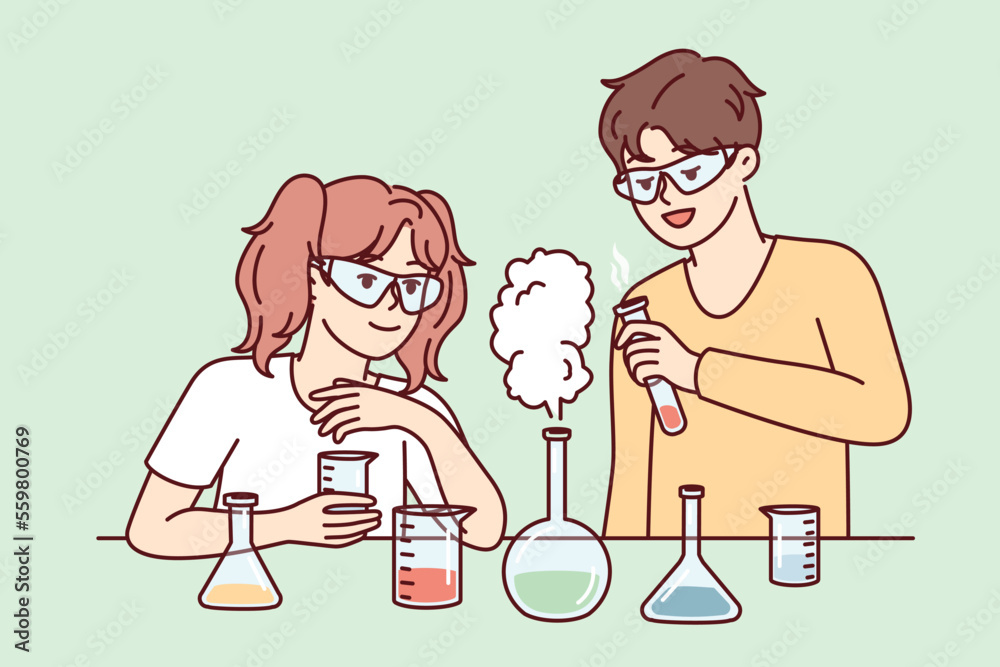 Youth boy and girl conduct chemical experiments standing near table with test tubes and pouring reagents. Elementary school students in goggles experimenting during laboratory work. Flat vector image Youth boy and girl conduct chemical experiments standing near table with test tubes and pouring reagents. Elementary school students in goggles experimenting during laboratory work. Flat vector image