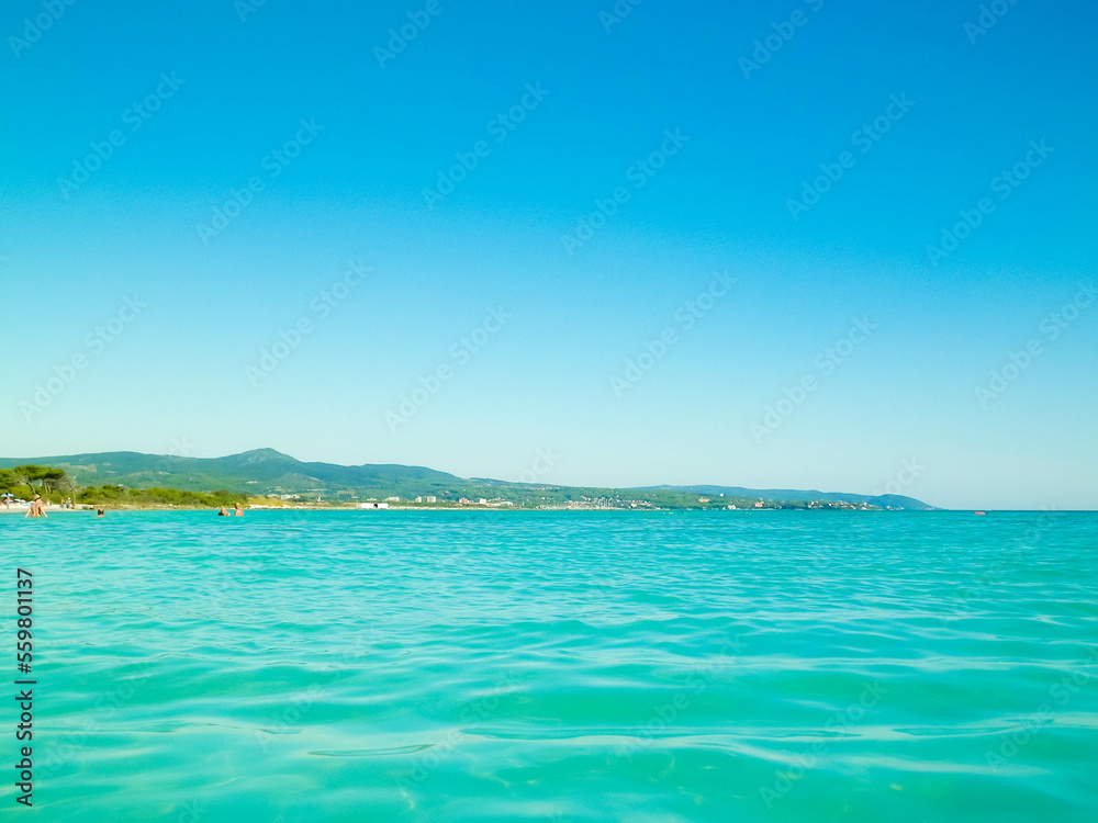 Blue water of Tyrrhenian sea in Vada, Tuscany, Italy.