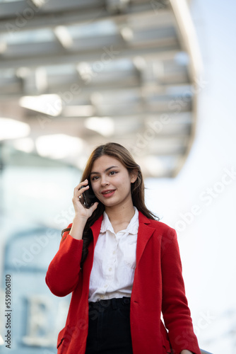 Young asian businesswoman using smart phone in office.. © PaeGAG