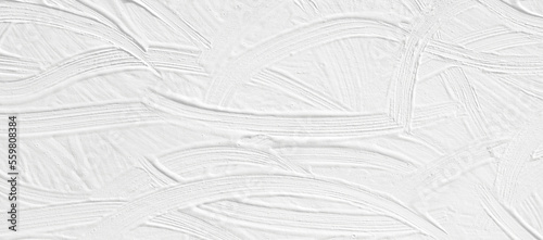White paint texture for a web intro or wall for a trendy post-construction renovation. Background with brush strokes with a pattern of stains and patterns for wallpaper.