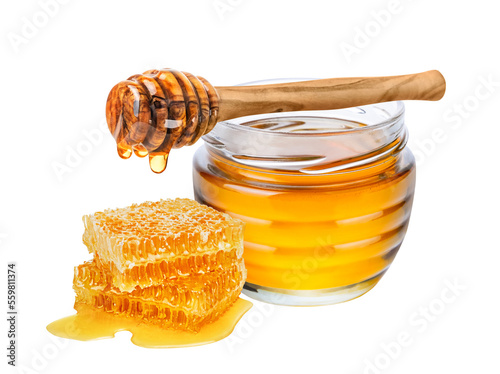Honey jar, honeycomb and honey dipper isolated on white or transparent background.