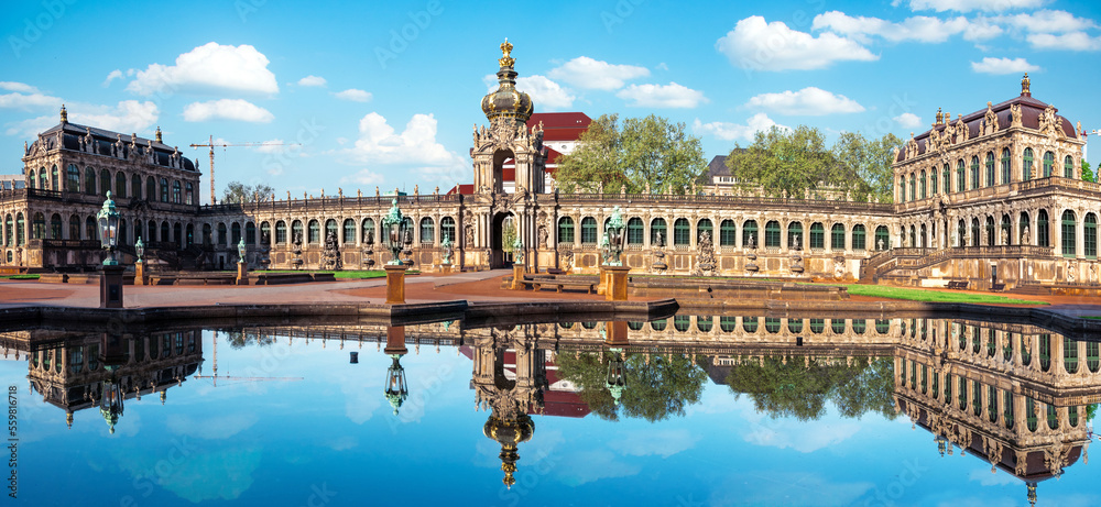 Beautiful View of the complex Zwinger with reflection in the water of the fountain in Dresden. Saxony, Germany