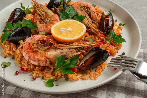 Seafood paella, shrimp and mussels risotto, rice, homemade, top view, no people,