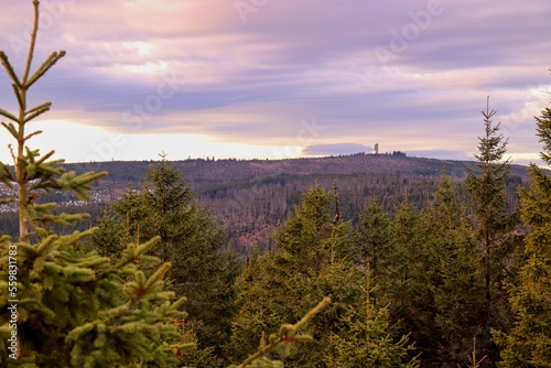A sunset above the famous lookout tower Polednik at Sumava national park, Czech republic photo