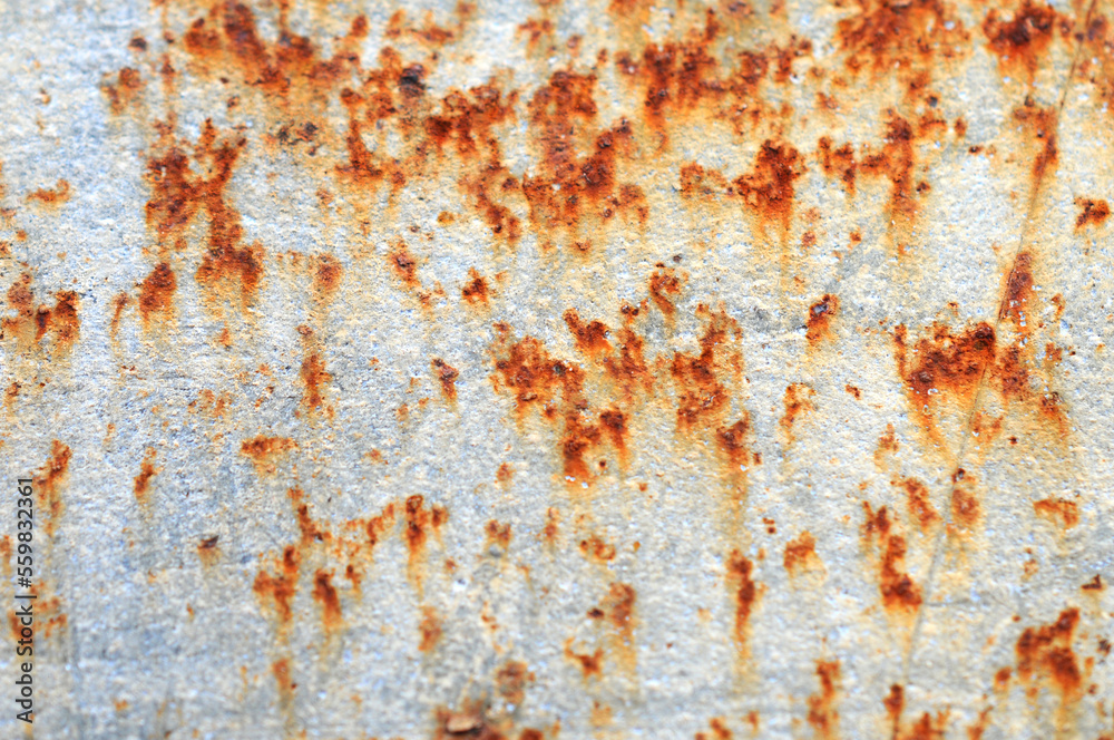 Fototapeta premium The surface of the old iron has rusted and peeled off. Rust stains on galvanized. Abstract background for decorative and work design.