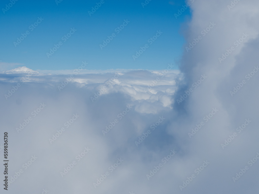 High fluffy clouds seen from the height