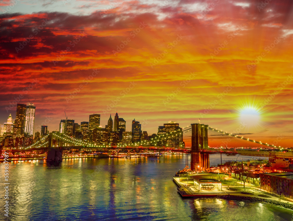 Skyline of New York City at sunset from Manhattan Bridge