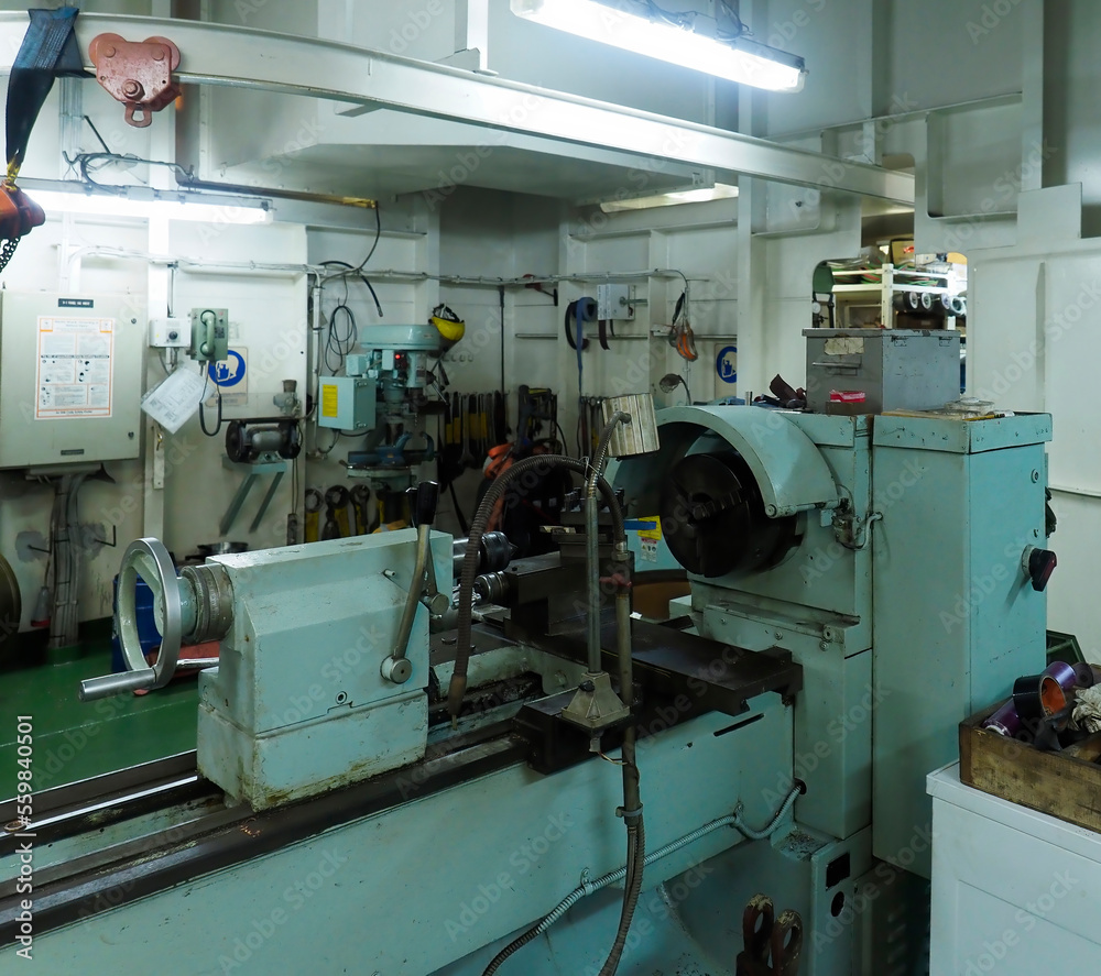 old green lathe in the workshop