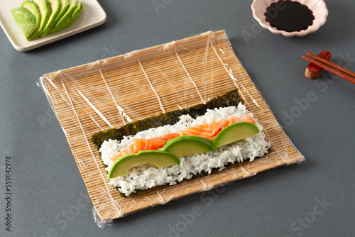 Process of making maki sushi photo