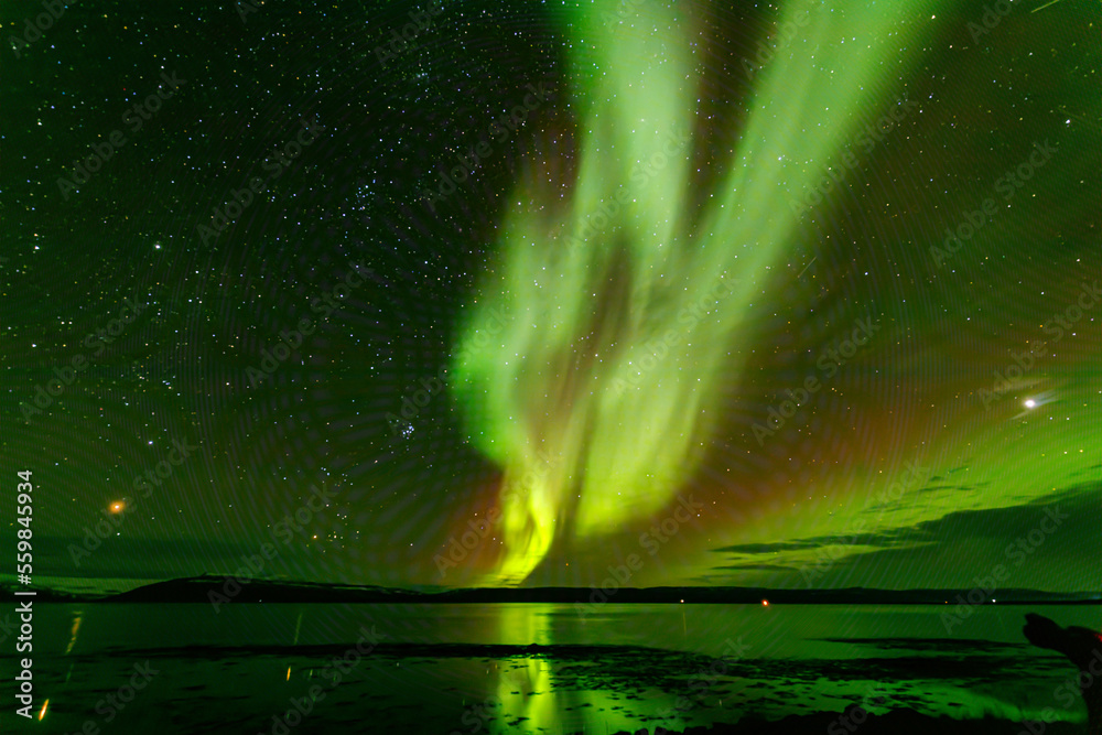 Aurora over Isafjardardjup in North Iceland