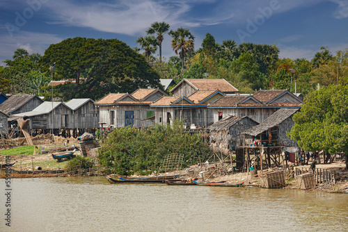 Poor Cambodians living in poverty along a river © David Davis