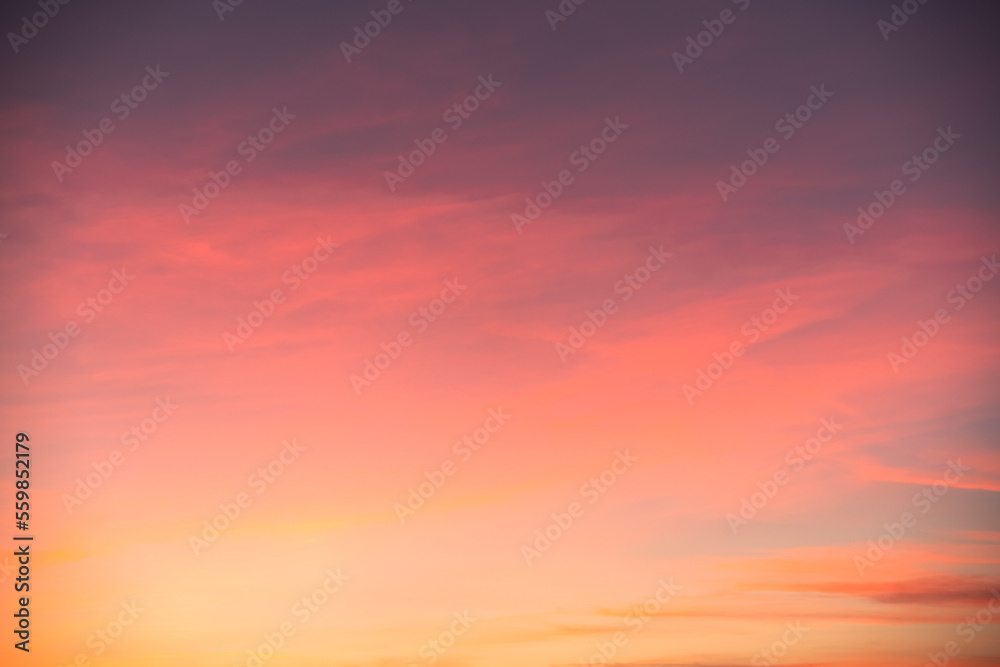 Blurry gradient pink orange blue purple. Blurred gradient pink orange blue purple. From light to dark. Sunset sky in variegated colors. Romantic background without details