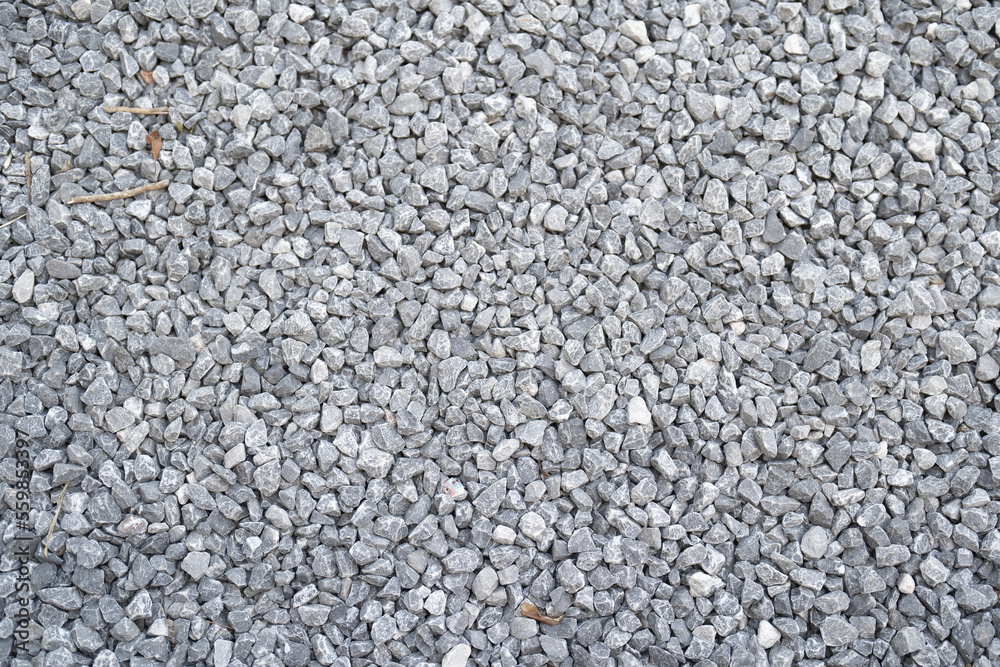 Granite gravel stone rocks flooring pattern surface texture. Close-up of exterior material for design decoration background. Rubble Granite gravel stone rocks flooring pattern surface texture. Close-up of exterior material for design decoration background. Rubble