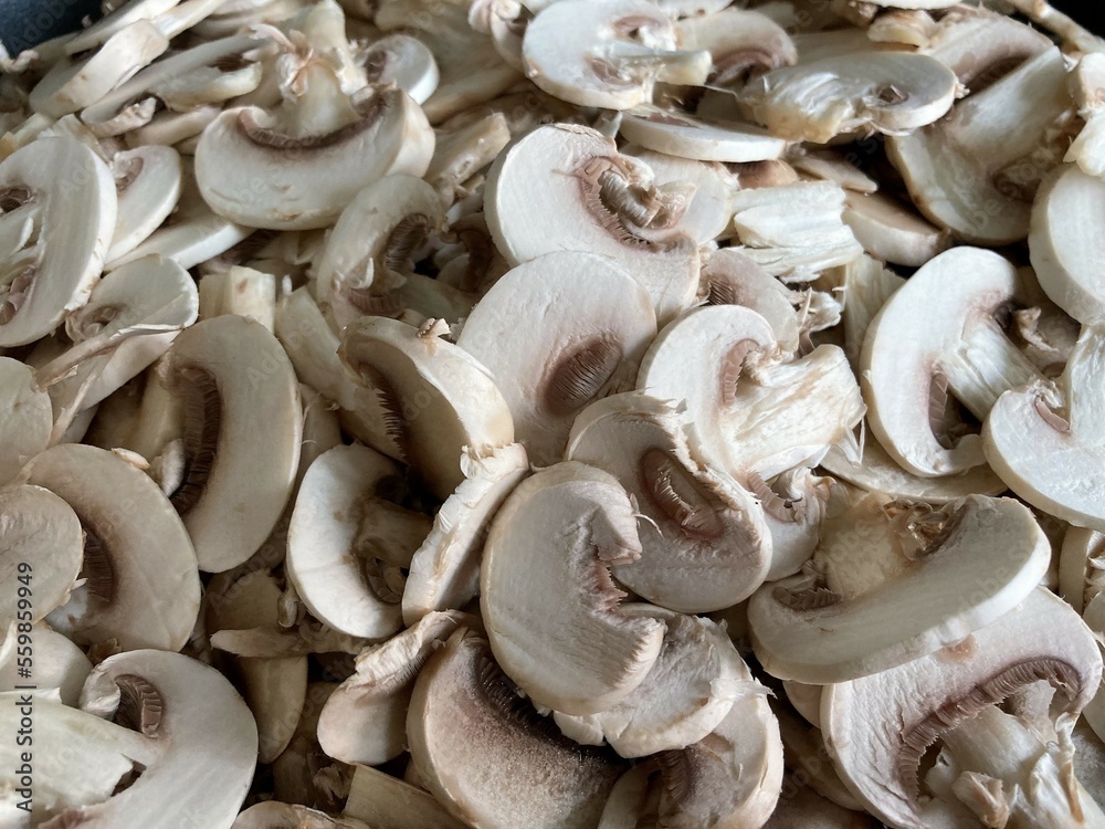 Close-up of sliced fresh button mushrooms Close-up of sliced fresh button mushrooms