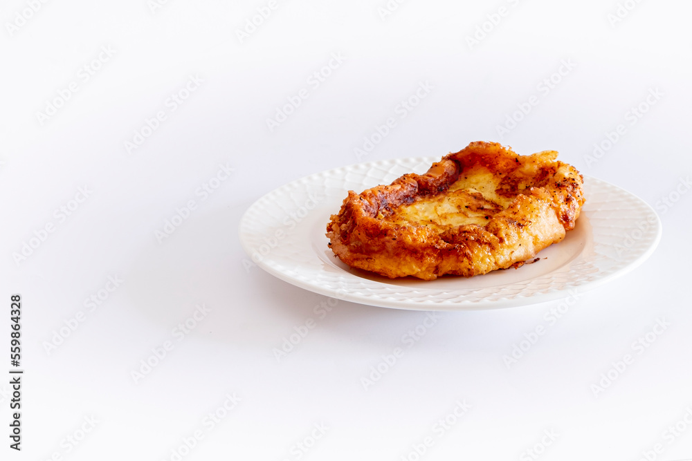 Fried French toast (Torrijas). Typical Spanish Easter sweet. Vertical photography and selective focus Fried French toast (Torrijas). Typical Spanish Easter sweet. Vertical photography and selective focus