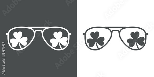 Día de San Patricio. Silueta aislada de gafas de sol con reflejo de shamrock de 3 hojas
