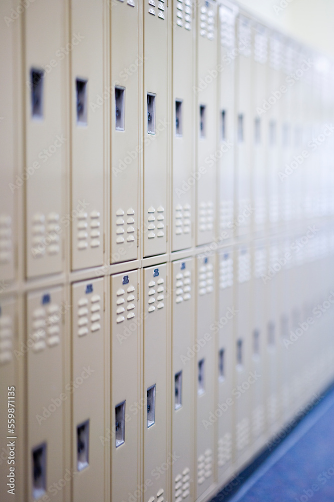 A wall of student lockers in a school hallway.