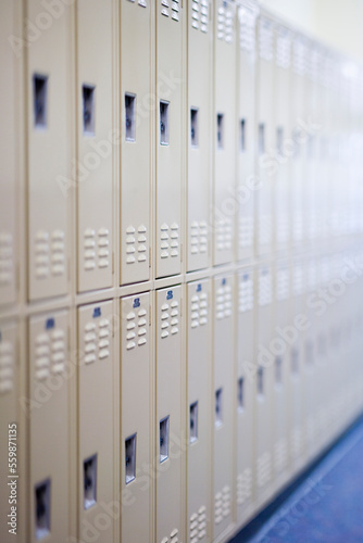 A wall of student lockers in a school hallway.