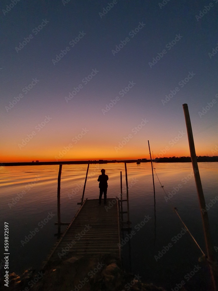 Fototapeta premium fishing at sunset