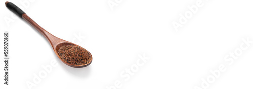 Isolated Himalayan black salt in wooden spoon, Kala Namak, cooling ayurvedic spice Indian Asian cuisine, healthy food. Kiln fired rock salt . White background. Flatly, horizontal plane. Space for text photo