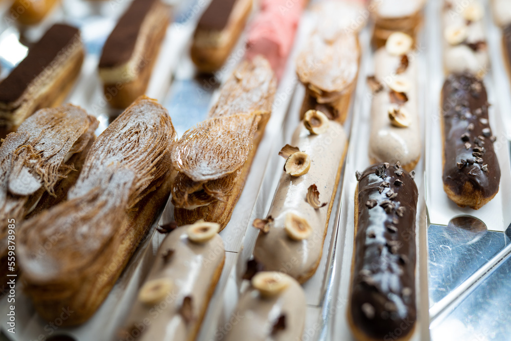 various delicious sweet pastries in the shop window. various delicious sweet pastries in the shop window.