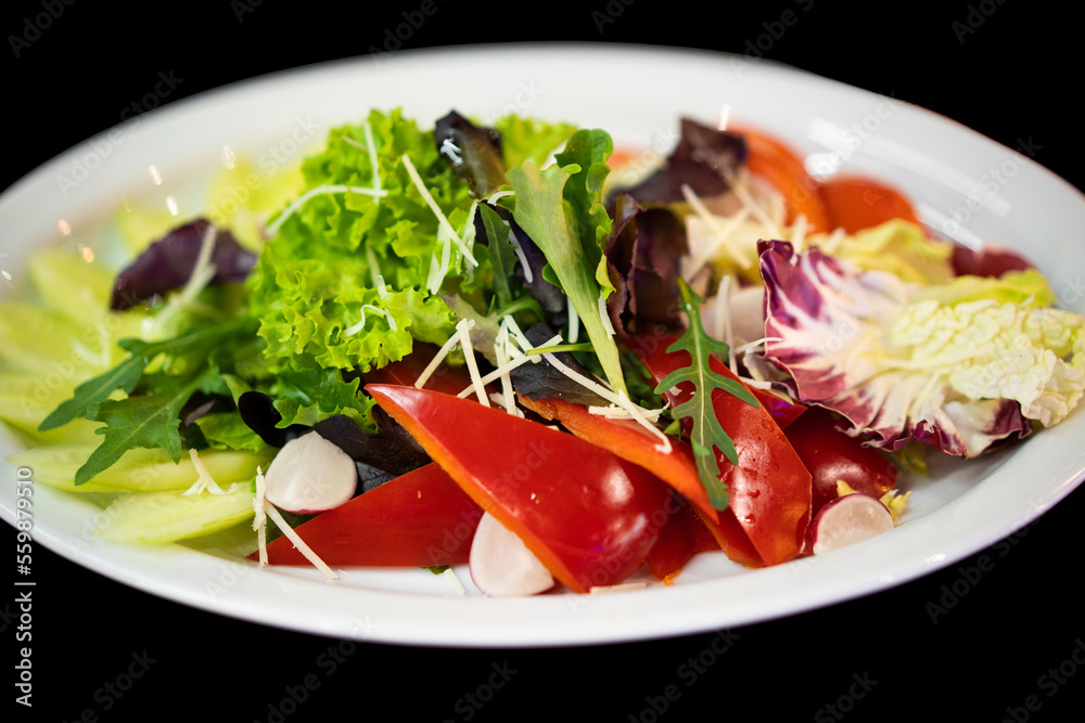 close up of a good serving of delicious salad from the chef in a restaurant close up of a good serving of delicious salad from the chef in a restaurant